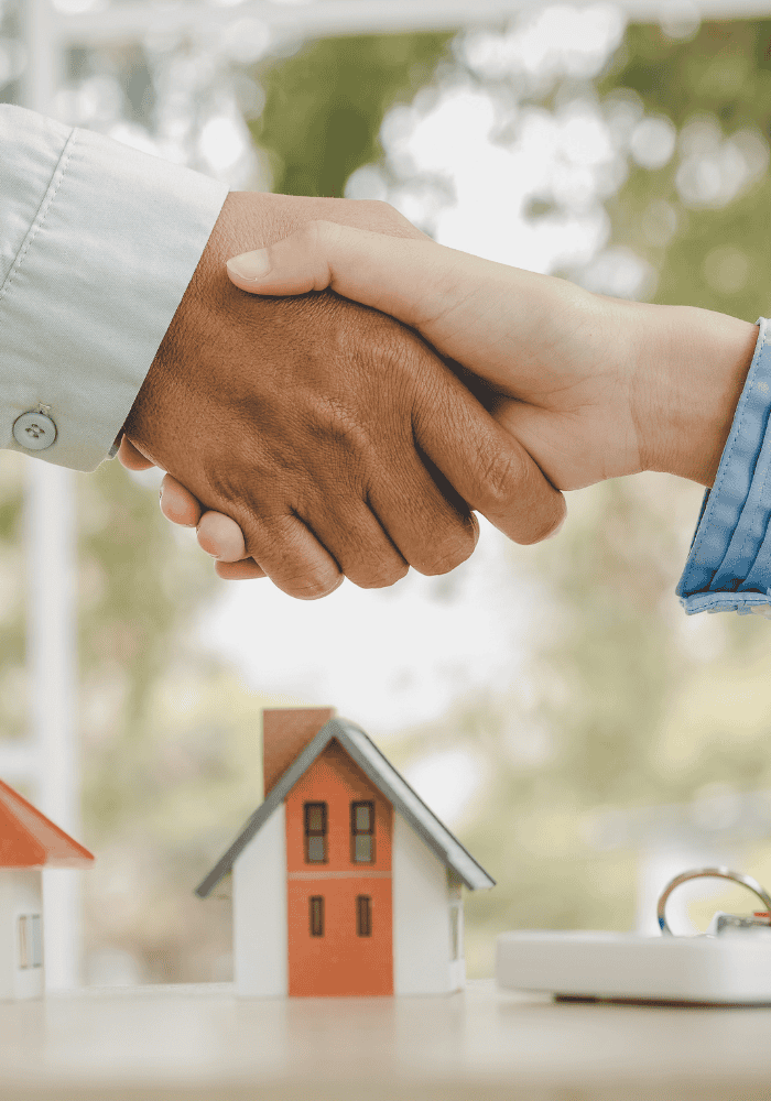 FCS representative shaking hands with a homeowner